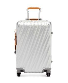 Valise Tumi aluminium gaufré finition cuir
